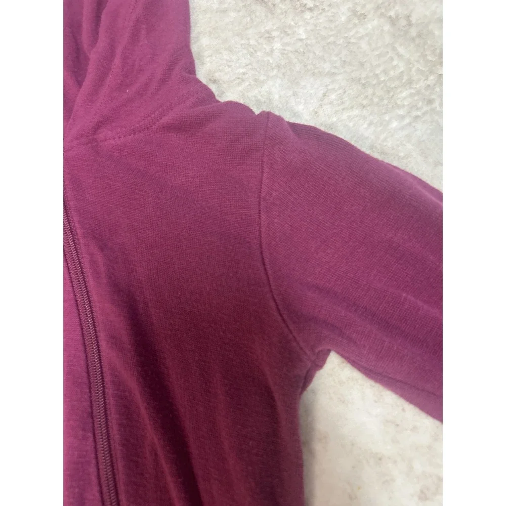 Kyte Baby Bamboo Jersey Hooded Zippered Romper in the color Dahlia